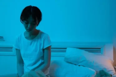 Person feeling tired after enough sleep